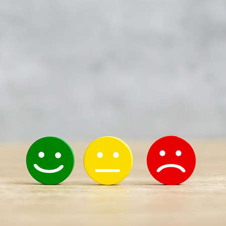 emotion face block. Customer choose Emoticon for user reviews. Service rating, ranking, customer review, satisfaction, mood, evaluation and feedback conceptの写真素材