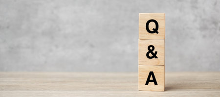 Q and A word with wooden block. FAQ( frequency asked questions), Answer, Question  Ask, Information, Communication and Brainstorming Conceptsの写真素材