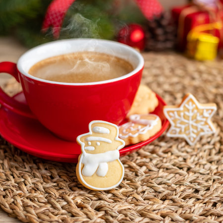 Merry Christmas with homemade cookies and coffee cup on wood table background. Xmas eve, party, holiday and happy New Year conceptの写真素材