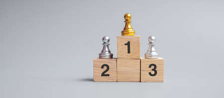 top of golden chess pawn pieces or leader businessman. victory, leadership, business success, team, recruiting, and teamwork conceptの写真素材