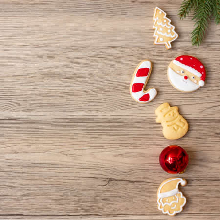Merry Christmas with homemade cookies on wood table background. Xmas, party, holiday and happy New Year conceptの写真素材
