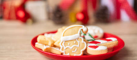 Merry Christmas with homemade cookies on wood table background. Xmas, party, holiday and happy New Year conceptの写真素材