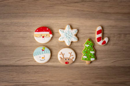 Merry Christmas with homemade cookies on wood table background. Xmas, party, holiday and happy New Year conceptの写真素材