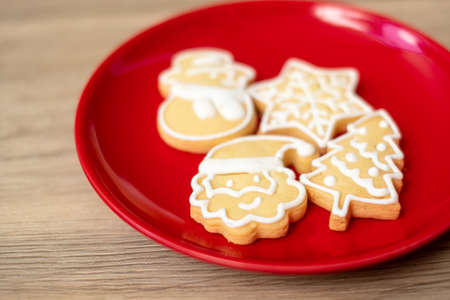 Merry Christmas with homemade cookies on wood table background. Xmas, party, holiday and happy New Year conceptの写真素材