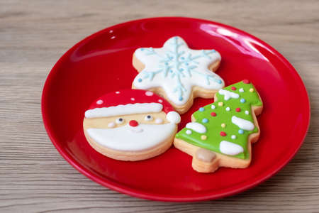 Merry Christmas with homemade cookies on wood table background. Xmas, party, holiday and happy New Year conceptの写真素材