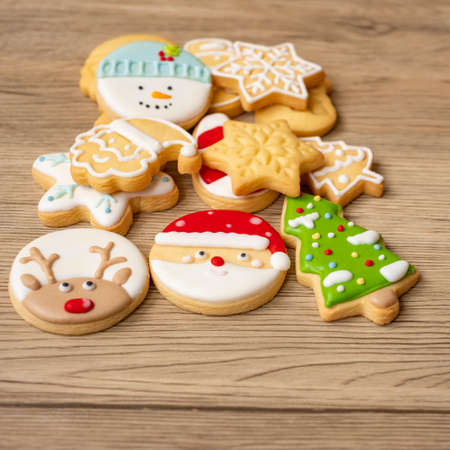 Merry Christmas with homemade cookies on wood table background. Xmas, party, holiday and happy New Year conceptの写真素材