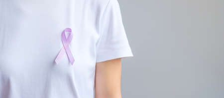 World cancer day (February 4). Lavender purple ribbon for supporting people living and illness. Healthcare and medical conceptの写真素材