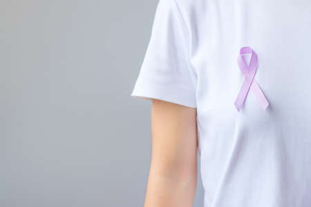 World cancer day (February 4). Lavender purple ribbon for supporting people living and illness. Healthcare and medical conceptの写真素材