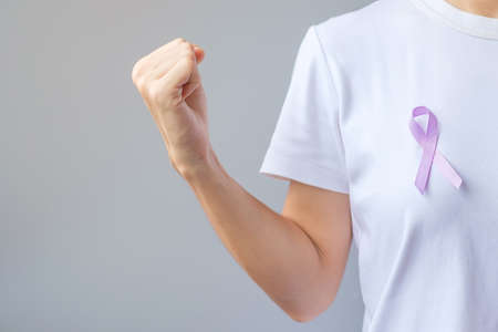 World cancer day (February 4). Lavender purple ribbon for supporting people living and illness. Healthcare and medical conceptの写真素材