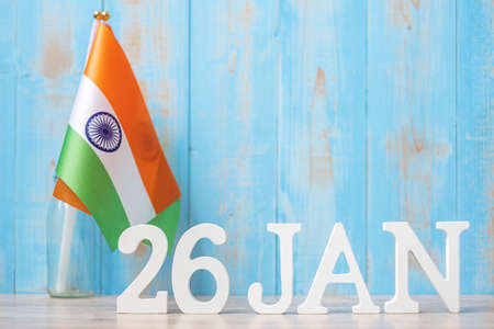 Wooden text of January 26th with miniature India flags. India republic Day and happy celebration conceptsの写真素材