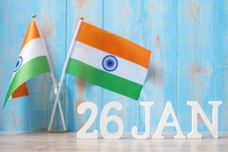 Wooden text of January 26th with miniature India flags. India republic Day and happy celebration conceptsの写真素材