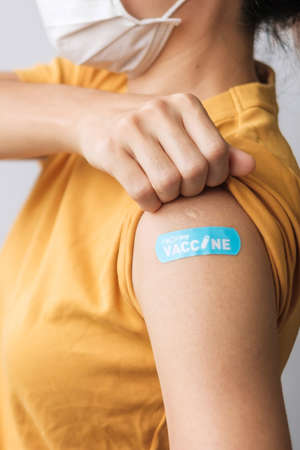 woman showing bandageの写真素材