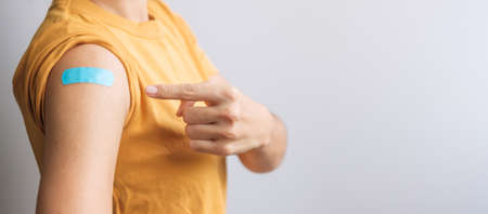 woman showing bandageの写真素材