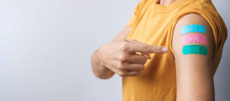 woman showing plasterの写真素材