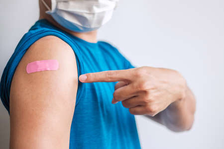 man showing bandageの写真素材