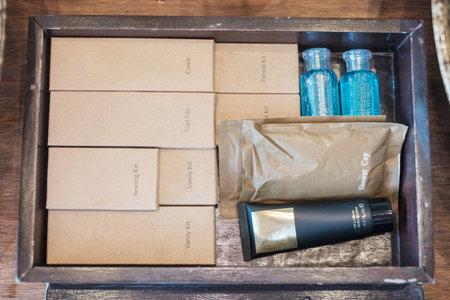 Toiletries in bathroom at luxury hotel or modern home. body shower cap, sewing, dental kit, nail file and body lotionの写真素材