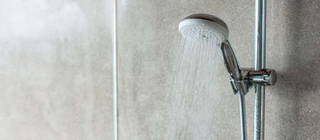 shower head with wall background in modern bathroomの写真素材