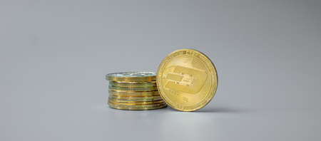 golden Dash cryptocurrency coin stack, Crypto is Digital Money within the blockchain network, is...