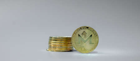 golden Monero (XMR) cryptocurrency coin stack, Crypto is Digital Money within the blockchain network, is exchanged using technology and online internet exchange. Financial conceptの写真素材