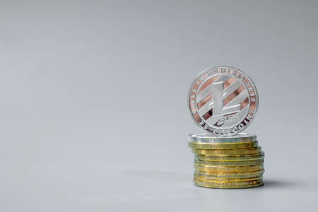 Silver Litecoin (LTC) cryptocurrency coin stack, Crypto is Digital Money within the blockchain network, is exchanged using technology and online internet exchange. Financial conceptの写真素材