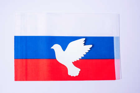 Support for Russia in the war, peace dove with flag of Russia. Pray, No war, stop war and stand with Russia conceptsの写真素材