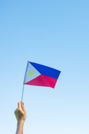 hand holding Philippines flag on nature background. 12th June of Independence day and happy celebration conceptsの写真素材