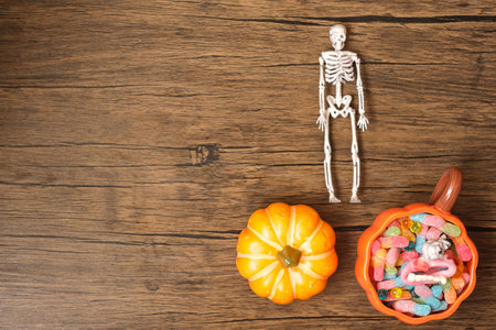 Happy Halloween day with ghost candies, pumpkin,  bowl and decorative. Trick or Threat, Hello October, fall autumn, Festive, party and holiday conceptの写真素材