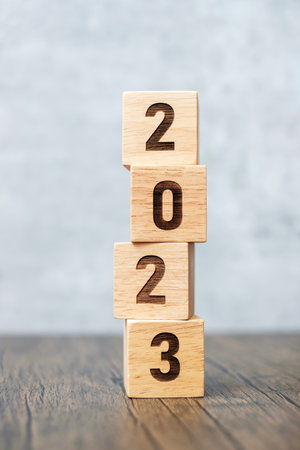 2023 year block on table. goal, Resolution, strategy, plan,, start, budget, mission, action, motivation and New Year holiday conceptsの写真素材