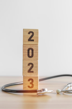 2023 Happy New Year for health care, Insurance, Wellness and medical concept. Stethoscope of doctor...