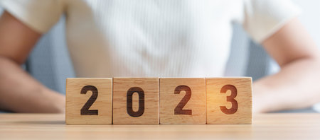 2023 year block on table. goal, Resolution, strategy, plan, start, budget, mission, action,...
