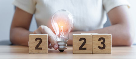 2023 block with lightbulb. Business Idea, Creative, Thinking, brainstorm, Goal, Resolution,...