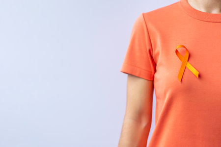 Orange Ribbon for Leukemia, Kidney cancer day, world Multiple Sclerosis, CRPS, Self Injury Awareness month. Healthcare and word cancer day conceptの写真素材