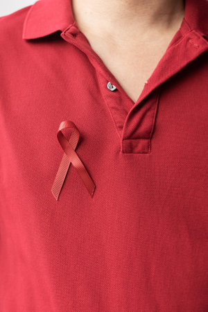 Burgundy Red Ribbon for March multiple myeloma Cancer and December World Aids Day Awareness month....