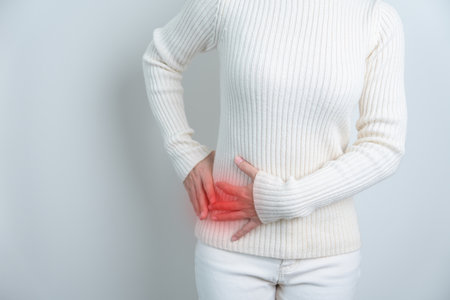 woman having side back pain. Urinary system and Stones, Cancer, world kidney day, Chronic kidney...