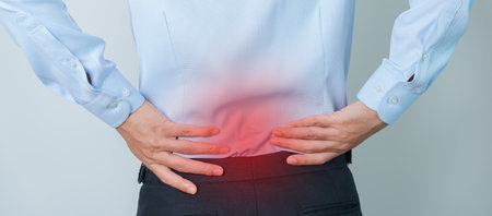 man having back pain. Urinary system and Stones, Cancer, world kidney day, Chronic kidney stomach, liver pain and pancreas conceptの写真素材