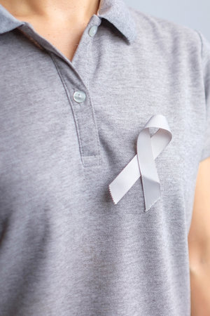 Brain Cancer Awareness month, grey color Ribbon for supporting people life. Healthcare and World...
