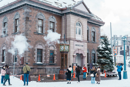 Otaru Music Box Museum and stream Clock with Snow in winter season. landmark and popular for attractions in Hokkaido, Japan. Otaru, Japan, 8 February 2023のeditorial素材