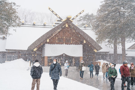 Hokkaido Jingu Shrine with Snow in winter season, Japanese buddhism shinto temple. landmark and popular for attractions in Hokkaido, Japan. Sapporo, Japan, 9 February 2023のeditorial素材