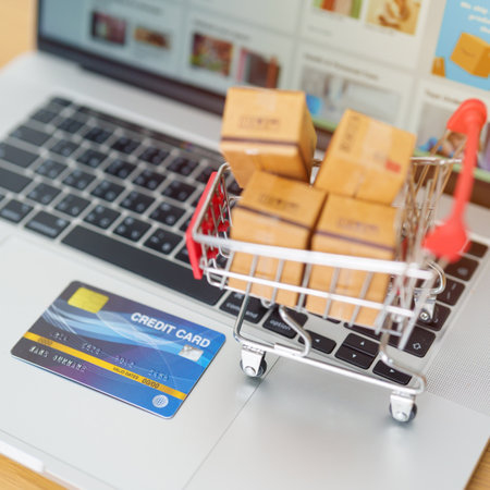 Boxes with credit card on a laptop computer. online shopping, Marketplace platform website, technology, ecommerce, shipping delivery, logistics and online payment conceptsの写真素材