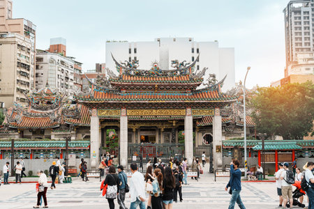 Longshan Temple, Chinese folk religious temple in Wanhua District, Taipei City. landmark and popular for tourists attractions. Taipei, Taiwan, 4 April 2023のeditorial素材