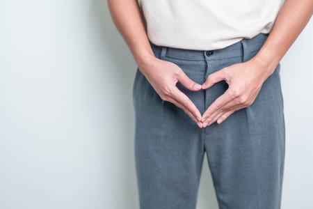 Older Man having Prostate gland or Urinary bladder pain. Prostate Cancer, Enlarged prostate, Prostatitis disease, Hypothyroidism, Male Infertility, Health and World cancer day conceptの写真素材
