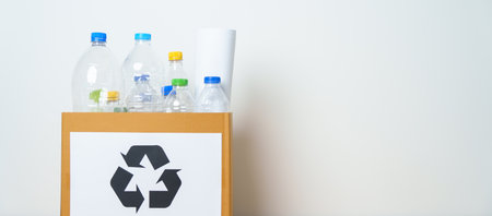 Plastic bottle in paper box at home or office. Recycle garbage Sorting. Plastic Free, Ecology,...
