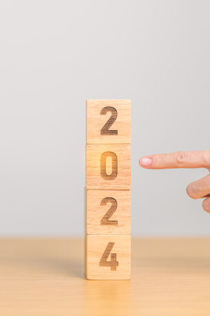 2024 year block on table. goal, Resolution, strategy, plan, start, budget, mission, action, motivation and New Year conceptsの写真素材