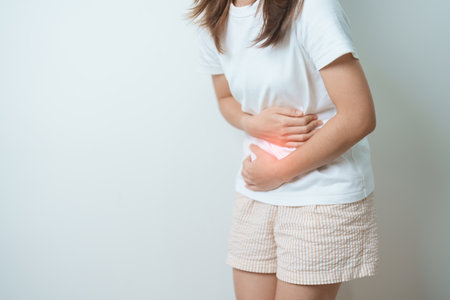 woman having abdomen ache due to Stomach pain, digestion with constipation or Diarrhea from food...