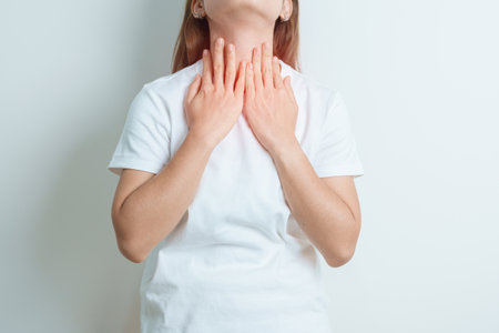 Gastroesophageal Reflux Disease or GERD, Acid reflux disease, Gastro Oesophageal or GORD and Dyspepsia concept. woman having Stomach ache and Esophageal pain due to Digestion system problemの写真素材
