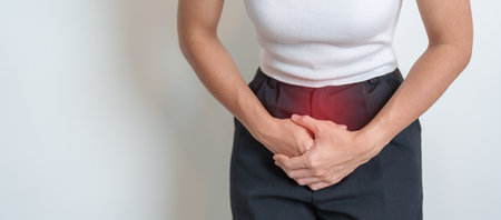 Woman having Stomach pain. Ovarian and Cervical cancer, Cervix disorder, Endometriosis, Hysterectomy, Uterine fibroids, Reproductive system, menstruation, diarrhea, digestive system and Pregnancyの写真素材