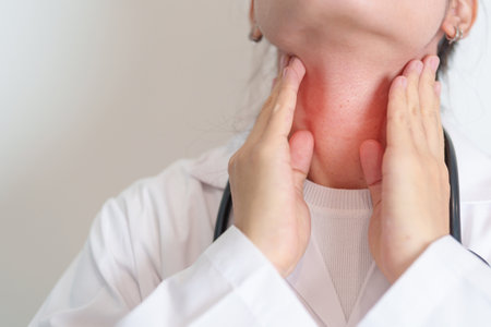 Woman checking Thyroid gland disease. Hand holding Neck pain. Hyperthyroidism, Hypothyroidism,...