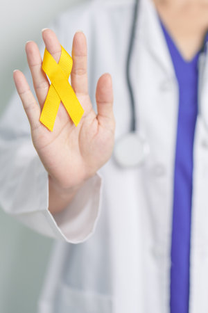 Sarcoma Cancer day July, Yellow September, Suicide prevention day, Childhood, bone and bladder cancer Awareness month, Yellow Ribbon for supporting people life and illness. Health and World cancer dayの写真素材