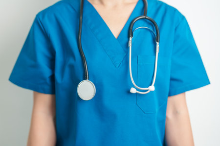 Healthcare and medical concept. doctor hand hold stethoscope in hospital. Health background, wellness and Insuranceの写真素材