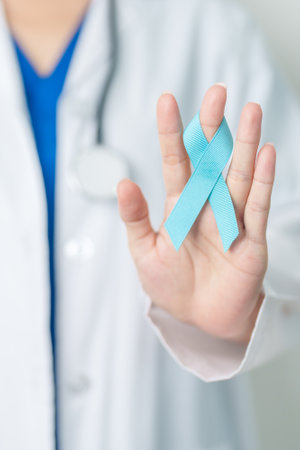 Blue November Prostate Cancer Awareness month, Doctor with Blue Ribbon in hospital for support people life and illness. Healthcare, International men, Father, Diabetes and World cancer dayの写真素材